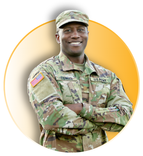 Austin Tidwell stands with arms crossed and smiling while wearing Army uniform